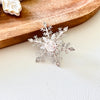 Dainty Spinning Snowflake Brooch