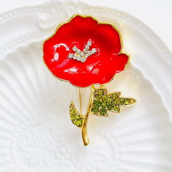 Broche de amapola roja con centro de cristal