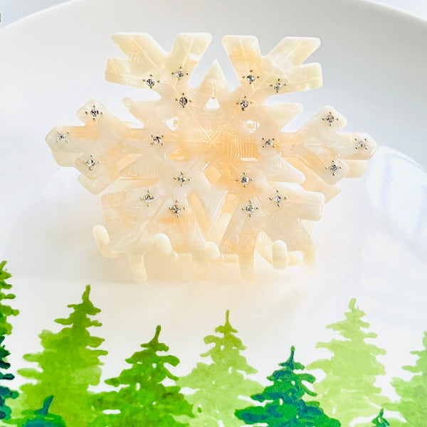 Pinza para el pelo con forma de copo de nieve