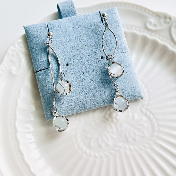 Uranus Tassel Earrings