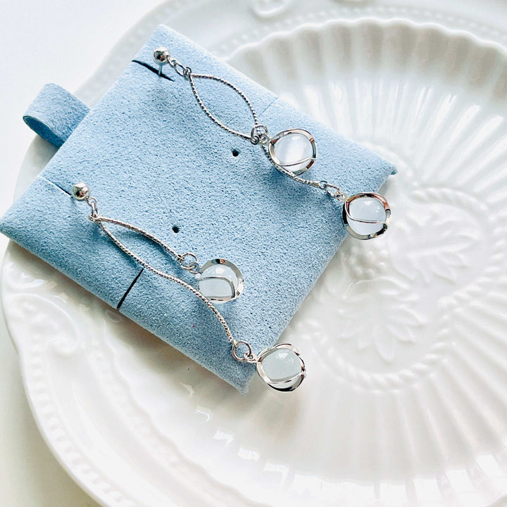 Uranus Tassel Earrings
